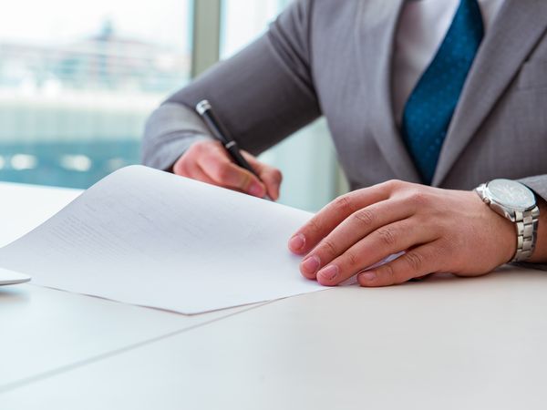 person signing a document for apostille